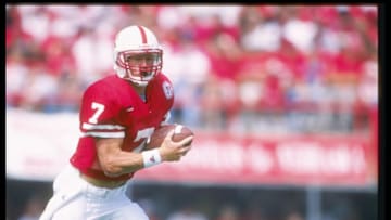7 Sep 1996: Quarterback Scott Frost of the Nebraska Cornhuskers scrambles with the ball during a game against the Michigan State Spartans at Memorial Stadium in Lincoln, Nebraska. Nebraska won the game 55-14. Mandatory Credit: Stephen Dunn /Allsport