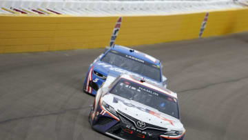Denny Hamlin, Joe Gibbs Racing, and Kyle Larson, Hendrick Motorsports, NASCAR (Photo by Brian Lawdermilk/Getty Images)