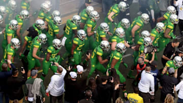 LAS VEGAS, NV - DECEMBER 16: The Oregon Ducks run onto the field as they are introduced before taking on the Boise State Broncos in the Las Vegas Bowl at Sam Boyd Stadium on December 16, 2017 in Las Vegas, Nevada. Boise State won 38-28. (Photo by Ethan Miller/Getty Images)
