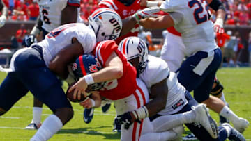 OXFORD, MS - SEPTEMBER 9: Quarterback Shea Patterson #20 of the Mississippi Rebels is stopped just short of the goal line by safety Kahlid Hagens #18 of the Tennessee Martin Skyhawks and linebacker TJ Jefferson #44 during the second quarter of an NCAA football game at Vaught-Hemingway Stadium on September 9, 2017 in OXFORD, Mississippi. (Photo by Butch Dill/Getty Images)