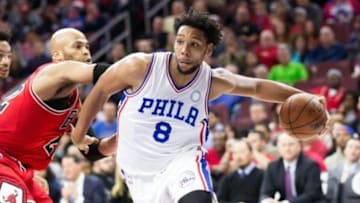 Nov 9, 2015; Philadelphia, PA, USA; Philadelphia 76ers center Jahlil Okafor (8) drives past Chicago Bulls forward Taj Gibson (22) during the second quarter at Wells Fargo Center. Mandatory Credit: Bill Streicher-USA TODAY Sports