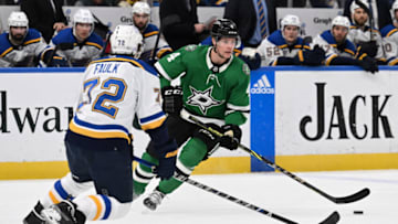 Nov 28, 2022; St. Louis, Missouri, USA; St. Louis Blues defenseman Justin Faulk (72) defends against Dallas Stars defenseman Miro Heiskanen (4) in the first period at Enterprise Center. Mandatory Credit: Joe Puetz-USA TODAY Sports