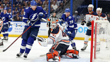 TAMPA, FL - FEBRUARY 23: Corey Perry #10 of the Tampa Bay Lightning scores a goal past Mike Smith #41 of the Edmonton Oilers during the second period at the Amalie Arena on February 23, 2022 in Tampa, Florida. (Photo by Mike Carlson/Getty Images)