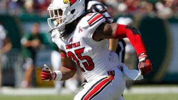 Oct 26, 2013; Tampa, FL, USA; Louisville Cardinals safety Calvin Pryor (25) rushes against the South Florida Bulls during the second half at Raymond James Stadium. Mandatory Credit: Kim Klement-USA TODAY Sports