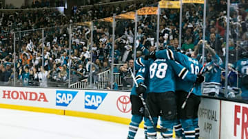 Apr 29, 2016; San Jose, CA, USA; San Jose Sharks center Logan Couture (39) celebrates with teammates after scoring a goal against the Nashville Predators in the third period in game one of the second round of the 2016 Stanley Cup Playoffs at SAP Center at San Jose. The Sharks won 5-2. Mandatory Credit: John Hefti-USA TODAY Sports