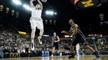Jan 2, 2016; Ann Arbor, MI, USA; Michigan Wolverines forward Mark Donnal (34) shoots in the first half against the Penn State Nittany Lions at Crisler Center. Mandatory Credit: Rick Osentoski-USA TODAY Sports
