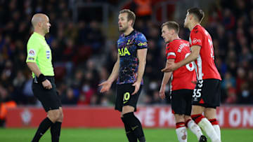 SOUTHAMPTON, ENGLAND - DECEMBER 28: Harry Kane of Tottenham Hotspur interacts with Match Referee Anthony Taylor during the Premier League match between Southampton and Tottenham Hotspur at St Mary's Stadium on December 28, 2021 in Southampton, England. (Photo by Michael Steele/Getty Images)