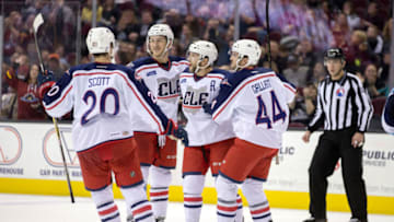 CLEVELAND, OH - DECEMBER 02: Cleveland Monsters C Justin Scott (20), Cleveland Monsters C Jordan Maletta (64), Cleveland Monsters D Jaime Sifers (26) and Cleveland Monsters LW Brett Gallant (44) celebrate after Cleveland Monsters D Jaime Sifers (26) scored a goal during the second period of the AHL hockey game between the Milwaukee Admirals and Cleveland Monsters on December 02, 2016, at Quicken Loans Arena in Cleveland, OH. Cleveland defeated Milwaukee 4-1. (Photo by Frank Jansky/Icon Sportswire via Getty Images)