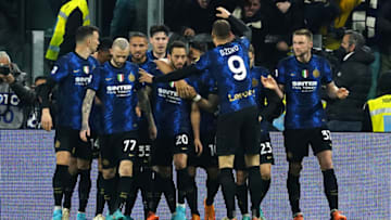 TURIN, ITALY - APRIL 03: Hakan Calhanoglu of FC Internazionale celebrates his first goal on penalty during the Serie A match between Juventus and FC Internazionale at Stadio Allianz on April 03, 2021 in Turin, Italy. (Photo by Pier Marco Tacca/Anadolu Agency via Getty Images)