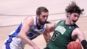 Creighton Bluejays guard Mitch Ballock (24) and Ohio Bobcats forward Ben Vander Plas (5) fall over during a play as the ball goes loose during the second round of the 2021 NCAA Tournament on Monday, March 22, 2021, at Hinkle Fieldhouse in Indianapolis, Ind. Mandatory Credit: Denny Simmons/IndyStar via USA TODAY Sports