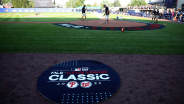 SOUTH WILLIAMSPORT, PENNSYLVANIA - AUGUST 20: Members of the grounds crew get the field ready before the start of the 2023 Little League Classic between the Philadelphia Phillies and Washington Nationals at Bowman Field on August 20, 2023 in South Williamsport, Pennsylvania. (Photo by Rob Carr/Getty Images)