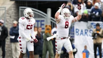 Nov 15, 2014; University Park, PA, USA; Temple Owls linebacker Tyler Matakevich (8) reacts after a sack during the second quarter against the Penn State Nittany Lions at Beaver Stadium. Mandatory Credit: Matthew O