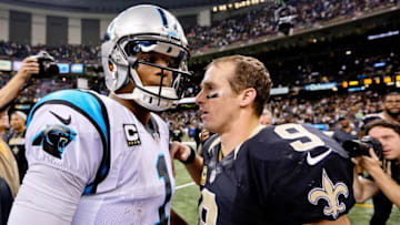 Dec 6, 2015; New Orleans, LA, USA; Carolina Panthers quarterback Cam Newton (1) shakes hands with New Orleans Saints quarterback Drew Brees (9) after their game at Mercedes-Benz Superdome. The Panthers defeated the Saints 41-38. Mandatory Credit: Derick E. Hingle-USA TODAY Sports