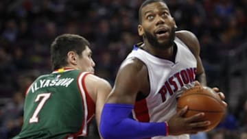 Nov 28, 2014; Auburn Hills, MI, USA; Detroit Pistons forward Greg Monroe (10) turns around Milwaukee Bucks forward Ersan Ilyasova (7) during the fourth quarter at The Palace of Auburn Hills. Bucks win 104-88. Mandatory Credit: Raj Mehta-USA TODAY Sports