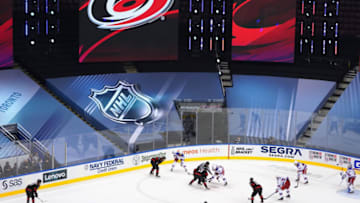 The New York Rangers skates against the Carolina Hurricanes in Game One of the Eastern Conference Qualification Round. (Photo by Andre Ringuette/Getty Images)