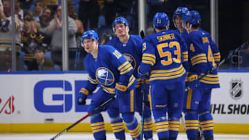 Sep 30, 2023; Buffalo, New York, USA; Buffalo Sabres defenseman Henri Jokiharju (10) celebrates his goal with teammates during the third period against the Columbus Blue Jackets at KeyBank Center. Mandatory Credit: Timothy T. Ludwig-USA TODAY Sports