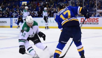 Nov 28, 2016; St. Louis, MO, USA; Dallas Stars center Radek Faksa (12) and St. Louis Blues left wing Jaden Schwartz (17) battle for the puck during the first period at Scottrade Center. Mandatory Credit: Jeff Curry-USA TODAY Sports