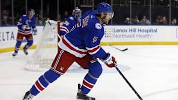 Oct 23, 2016; New York, NY, USA; New York Rangers defenseman Dan Girardi (5) controls the puck during the first period against the Arizona Coyotes at Madison Square Garden. Mandatory Credit: Adam Hunger-USA TODAY Sports