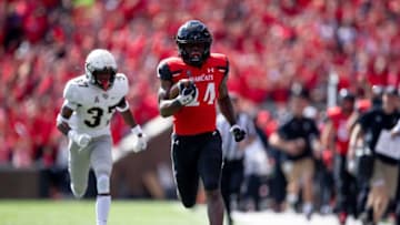 Cincinnati Bearcats running back Jerome Ford runs for a touchdown against UCF Knights at Nippert Stadium. The Enquirer.