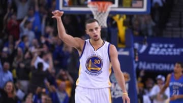 December 18, 2014; Oakland, CA, USA; Golden State Warriors guard Stephen Curry (30) celebrates against the Oklahoma City Thunder during the second quarter at Oracle Arena. The Warriors defeated the Thunder 114-109. Mandatory Credit: Kyle Terada-USA TODAY Sports