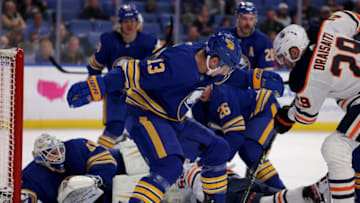 Nov 12, 2021; Buffalo, New York, USA; Buffalo Sabres defenseman Mark Pysyk (13) blocks a shot by Edmonton Oilers center Leon Draisaitl (29) during the first period at KeyBank Center. Mandatory Credit: Timothy T. Ludwig-USA TODAY Sports