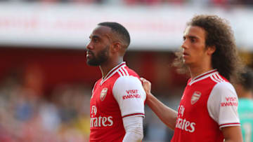 LONDON, ENGLAND - SEPTEMBER 01: Alexandre Lacazette of Arsenal celebrates scoring his team's first goal with team mate Matteo Guendouzi of Arsenal during the Premier League match between Arsenal FC and Tottenham Hotspur at Emirates Stadium on September 01, 2019 in London, United Kingdom. (Photo by Catherine Ivill/Getty Images)
