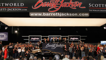 SCOTTSDALE, AZ - JANUARY 18: Simon Cowell's 2008 Bugatti Veyron enters the auction area during the 43rd Annual Barrett-Jackson Scottsdale Auction at WestWorld of Scottsdale on January 18, 2014 in Scottsdale, Arizona. (Photo by Mike Moore/Getty Images)