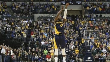 Feb 22, 2015; Indianapolis, IN, USA; Indiana Pacers guard C.J. Miles (0) makes a game winning three point shot with 28 seconds to go against the Golden State Warriors at Bankers Life Fieldhouse. Indiana defeats Golden State 104-98. Mandatory Credit: Brian Spurlock-USA TODAY Sports