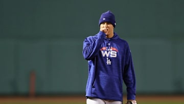 BOSTON, MA - OCTOBER 22: Manny Machado #8 of the Los Angeles Dodgers looks on during workouts ahead of the 2018 World Series against the Boston Red Sox at Fenway Park on October 22, 2018 in Boston, Massachusetts. (Photo by Elsa/Getty Images)