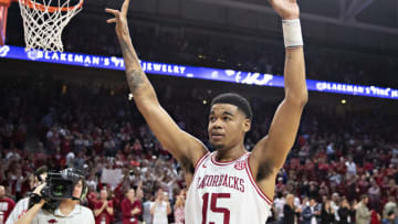 FAYETTEVILLE, AR - MARCH 4: Mason Jones #15 of the Arkansas Razorbacks gets the crowd cheering during a game against the LSU Tigers at Bud Walton Arena on March 4, 2020 in Fayetteville, Arkansas. The Razorbacks defeated the Tigers 99-90. (Photo by Wesley Hitt/Getty Images)