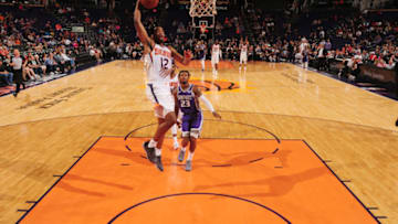 PHOENIX, AZ - OCTOBER 1: TJ Warren #12 of the Phoenix Suns shoots the ball against the the Sacramento Kings during a pre-season game on October 1, 2018 at Talking Stick Resort Arena in Phoenix, Arizona. NOTE TO USER: User expressly acknowledges and agrees that, by downloading and or using this photograph, user is consenting to the terms and conditions of the Getty Images License Agreement. Mandatory Copyright Notice: Copyright 2018 NBAE (Photo by Barry Gossage/NBAE via Getty Images)