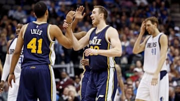 Feb 9, 2016; Dallas, TX, USA; Utah Jazz forward Gordon Hayward (20) and forward Trey Lyles (41) celebrate in front of Dallas Mavericks forward Dirk Nowitzki (41) during the game at American Airlines Center. Mandatory Credit: Kevin Jairaj-USA TODAY Sports