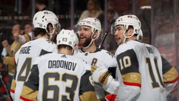 Nicolas Roy #10 of the Vegas Golden Knights is congratulated by teammates Evgenii Dadonov #63,Alex Pietrangelo #7 and Nicolas Hague #14 during the third period against the New Jersey Devils at Prudential Center on December 16, 2021 in Newark, New Jersey. The Vegas Golden Knights defeated the New Jersey Devils 5-3. (Photo by Elsa/Getty Images)