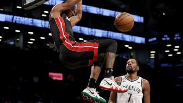 Miami Heat forward Jamal Cain (8) dunks against Brooklyn Nets forward Kevin Durant (7)(Brad Penner-USA TODAY Sports)