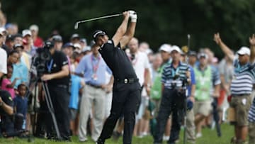 Jul 31, 2016; Springfield, NJ, USA; PGA golfer Jason Day hits a shot out of the rough on the 17th hole during the Sunday round of the 2016 PGA Championship golf tournament at Baltusrol GC - Lower Course. Mandatory Credit: Brian Spurlock-USA TODAY Sports