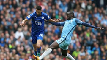 MANCHESTER, ENGLAND - MAY 13: Yaya Toure of Manchester City tackles Riyad Mahrez of Leicester City during the Premier League match between Manchester City and Leicester City at Etihad Stadium on May 13, 2017 in Manchester, England. (Photo by Alex Livesey/Getty Images)