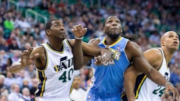 Jan 13, 2014; Salt Lake City, UT, USA; Utah Jazz small forward Jeremy Evans (40) and small forward Richard Jefferson (24) box out Denver Nuggets power forward Kenneth Faried (35) during the first half at EnergySolutions Arena. Mandatory Credit: Russ Isabella-USA TODAY Sports