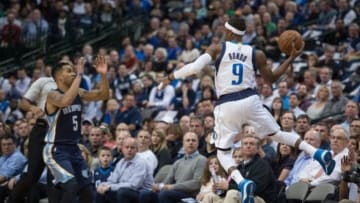 Jan 27, 2015; Dallas, TX, USA; Dallas Mavericks guard Rajon Rondo (9) jumps to keep the ball in bounds against the Memphis Grizzlies during the first quarter at the American Airlines Center. Mandatory Credit: Jerome Miron-USA TODAY Sports