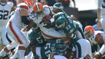 CLEVELAND, OH - SEPTEMBER 09: The the Philadelphia Eagles defense tackles during the game against the Cleveland Browns at Cleveland Browns Stadium on September 9, 2012 in Cleveland, Ohio. The Eagles won 17-16. (Photo by Drew Hallowell/Philadelphia Eagles/Getty Images)