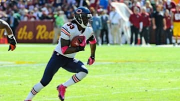 Oct 20, 2013; Landover, MD, USA; Chicago Bears cornerback Charles Tillman (33) runs after an interception against the Washington Redskins during the first half at FedEX Field. Mandatory Credit: Brad Mills-USA TODAY Sports