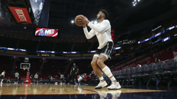 Jan 1, 2022; Houston, Texas, USA; Houston Rockets guard Trevelin Queen (21) warms up before the game against the Denver Nuggets at Toyota Center. Mandatory Credit: Troy Taormina-USA TODAY Sports