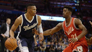 Dec 25, 2015; Oklahoma City, OK, USA; Oklahoma City Thunder guard Russell Westbrook (0) drives to the basket against Chicago Bulls guard Jimmy Butler (21) during the first half of a NBA basketball game on Christmas at Chesapeake Energy Arena. Mandatory Credit: Mark D. Smith-USA TODAY Sports