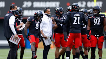 CINCINNATI, OH - OCTOBER 03: Defensive coordinator Marcus Freeman of the Cincinnati Bearcats talks to his players during a game against the South Florida Bulls at Nippert Stadium on October 3, 2020 in Cincinnati, Ohio. Cincinnati won 28-7. (Photo by Joe Robbins/Getty Images)
