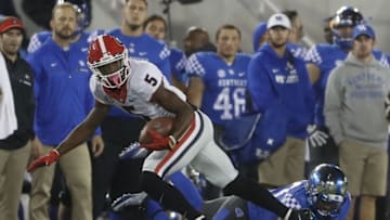 Nov 5, 2016; Lexington, KY, USA; Georgia Bulldogs wide receiver Terry Godwin (5) runs the ball against the Kentucky Wildcats in the second half at Commonwealth Stadium. Georgia defeated Kentucky 27-24. Mandatory Credit: Mark Zerof-USA TODAY Sports