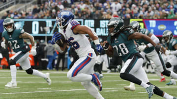 EAST RUTHERFORD, NEW JERSEY - NOVEMBER 28: (NEW YORK DAILIES OUT) Saquon Barkley #26 of the New York Giants in action against the Philadelphia Eagles at MetLife Stadium on November 28, 2021 in East Rutherford, New Jersey. The Giants defeated the eagles 13-7. (Photo by Jim McIsaac/Getty Images)