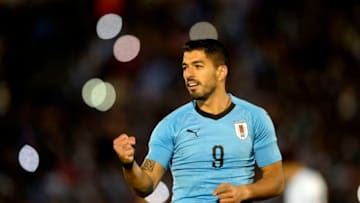 Uruguay's Luis Suarez celebrates after scoring during the international friendly football match between Uruguay and Uzbekistan at the Centenario stadium in Montevideo, on June 7, 2018. (Photo by Miguel Rojo / AFP) (Photo credit should read MIGUEL ROJO/AFP/Getty Images)
