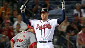 Sep 15, 2014; Atlanta, GA, USA; Atlanta Braves first baseman Freddie Freeman (5) reacts after being struck out in the sixth inning of their game against the Washington Nationals at Turner Field. Freeman was thrown out of the game. Mandatory Credit: Jason Getz-USA TODAY Sports