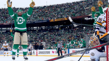DALLAS, TEXAS - JANUARY 01: Blake Comeau #15 and Andrew Cogliano #11 of the Dallas Stars celebrates his second-period goal against the Nashville Predators in the Bridgestone NHL Winter Classic at Cotton Bowl on January 01, 2020 in Dallas, Texas. (Photo by Ronald Martinez/Getty Images)
