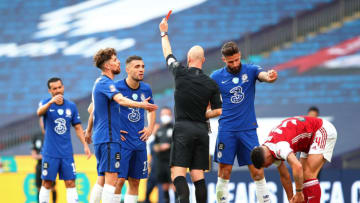 LONDON, ENGLAND - AUGUST 01: Referee Anthony Taylor awards Mateo Kovacic of Chelsea a red card, after he receives a second yellow card during the FA Cup Final match between Arsenal and Chelsea at Wembley Stadium on August 01, 2020 in London, England. Football Stadiums around Europe remain empty due to the Coronavirus Pandemic as Government social distancing laws prohibit fans inside venues resulting in all fixtures being played behind closed doors. (Photo by Marc Atkins/Getty Images)
