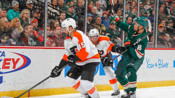 SAINT PAUL, MN - DECEMBER 14: Jakub Voracek #93 and Matt Niskanen #15 of the Philadelphia Flyers battle for the puck with Jordan Greenway #18 of the Minnesota Wild during the game at the Xcel Energy Center on December 14, 2019 in Saint Paul, Minnesota. (Photo by Bruce Kluckhohn/NHLI via Getty Images)